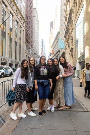 Einav Danino with YU students outside the exhibit